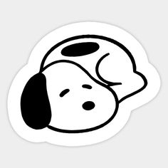 a black and white sticker with a dog's head resting on its side