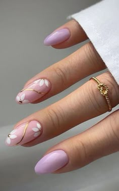 Looking for some flower nail designs? Check out this list of 35+ simple and cute flower nails! Perfect for gel, acrylic, and natural nails. Whether you prefer almond, oval, round, square, or coffin shapes, we've got you covered. From beautiful French tips to vibrant pink, white, blue, yellow, and green hues, these floral nail designs will add a touch of beauty to your fingertips. Floral Nail Art Acrylic, Nail Art In Almond Shape, Nail Art Designs For Natural Nails, Spring May Nails, Cool Oval Nail Designs, May Nails Ideas 2024 Flowers, Pink May Nails, Circle Nails Designs, Nail Art Round Shape