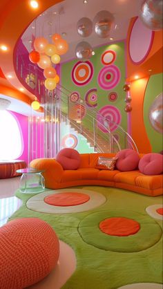 a living room filled with lots of colorful furniture and balloons hanging from the ceiling above