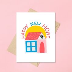 a card with a house and the words happy new home written in bold colors on it