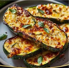 zucchini with cheese and herbs on a plate