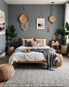 a bedroom with grey walls and wicker furniture