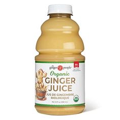 a bottle of organic ginger juice on a white background