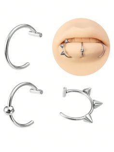 three pairs of silver nose rings with stars on each side and an open nose ring