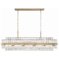 a rectangular chandelier with clear glass blocks hanging from the ceiling and gold chain