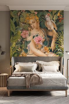 a bedroom with a large painting on the wall and a bed in front of it