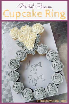 a cupcake ring with roses on it and the words, wedding shower cupcake ring