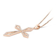 18K Rose Gold Gothic Style Open Cross Diamond Lined Pendant 
Celebrate your faith with this beautiful diamond open cross pendant. Fashioned in 18K rose gold, this Gothic-style design features an open cross shape with pointed edges - all lined with shimmering diamonds. Radiant with 0.75 ct. t.w. of diamonds and a bright polished shine, this pendant is the perfect gift for your loved one. 
0.75 carat
18k rose gold
We offer a Free virtual Consultation from the comfort of your ho Elegant Rose Gold Diamond Cross Necklace, Fine Jewelry Rose Gold Cross Pendant, Rose Gold Plated Cross Pendant Jewelry, Elegant Rose Gold Crucifix Cross Necklace, Gothic Gold Cross Pendant Jewelry, Luxury Diamond-accented Cross Pendant Necklace, Yellow Gold Diamond-cut Cross Pendant, Zipper Bracelet, Blue Cross