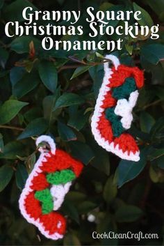 two crocheted christmas stockings hanging from a tree with the words granny square christmas stocking ornament