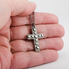 This cross is handmade of solid 925 sterling silver (92.5% pure silver) in my studio. I used a dark patina to bring out the details of the cross and give it the worn out look of time. Cross Height: 1 1/2 inch (3.5 cm) Width: 3/4 inch (2 cm) Necklace chain: choose your length Silver Cross Jewelry, Medieval Cross, Nails Pendant, Mens Cross Necklace, Hammered Sterling Silver, Great Gifts For Men, Christian Jewelry, Cross Jewelry, Sterling Silver Necklace Pendants