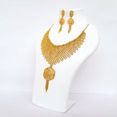 Partywear Necklace Set, Indian Jewelry, Bridal Jewelry, Festive Necklace Set, Wedding Jewellery Set, Bollywood Gold Necklace, Gift for women, 22k Gold Plated Elevate your style with our stunning Indian Bollywood Partywear Necklace Set! This exquisite jewelry ensemble exudes timeless elegance, perfect for weddings, festivals, and celebrations. Crafted with love and plated in radiant gold, this set is a tribute to tradition and beauty. ✨🎉 ✨Features: * Style: This necklace set showcases beautiful Elegant Yellow Gold Necklace For Marriage, Gold Plated Necklaces For Marriage, Kundan Necklace For Marriage, Elegant Gold Bridal Necklace For Wedding, Traditional Gold Chain Necklace For Wedding, Traditional Gold Wedding Chain Necklace, Gold Bridal Necklace With Intricate Design For Marriage, Bridal Necklace With Intricate Design For Wedding, Gold Plated Filigree Necklace For Weddings