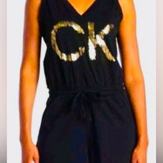 Nwt Look Great In This Flattering Black Jumpsuit With A Glitter Ck On The Chest Even Better If Your Initials Are Ck.Has A Tie Around The Waist Size Large Fitted Calvin Klein Jumpsuits And Rompers For Party, Chic Calvin Klein Jumpsuits And Rompers For Summer, Chic Calvin Klein Summer Jumpsuits And Rompers, Calvin Klein Summer Loungewear Tops, Calvin Klein Jumpsuit, Calvin Klein Pants, Calvin Klein Black, Black Jumpsuit, Womens Calvin Klein