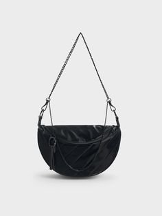 This version of the Philomena is not your average black bag. Made out of Lurex, the glossy material adds dimension to the black finish and gives it a luxe appearance. Keeping the rest of the design simple yet functional, there is enough space for more than just the bare essentials. Two strap options allow for maximum styling versatility -- the adjustable strap converts it into a casual crossbody, while the chain strap is suitable for more elevated occasions. Charles Keith, Design Simple, Black Bag, Half Moon, Jet Black, Chain Strap, Making Out, The Black, Simple Designs