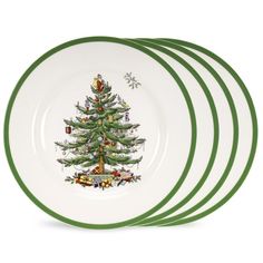 four green and white plates with a christmas tree on the front, one is empty