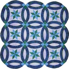 three blue and green quilts are arranged in the shape of circles on a white background