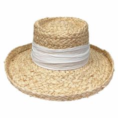 Experience beachside sophistication with the Saint Martin Resort Gambler Hat. Made from 100% raffia straw, this hat features a delicate chiffon trim and bow, giving it a touch of elegance. The 4 inch brim provides ample shade while the size adjuster ensures a perfect fit. Elevate your summer style now! The Details: Made from 100% Raffia Straw Chiffon Trim & Bow Brass Saint Martin Pin Inner Size Adjuster Grosgrain Sweatband 4" Brim | 3.75" Crown Chic Cream Toquilla Straw Boater Hat, Summer Curved Brim Boater Hat For Picnic, Summer Picnic Boater Hat With Curved Brim, Spring Coastal Boater Hat Made Of Toquilla Straw, Chic Cream Boater Hat For Garden Party, Chic Beige Straw Hat For Garden Party, Beige Boater Hat For Summer Picnic, Elegant Natural Panama Hat For Spring, Chic Cream Straw Hat