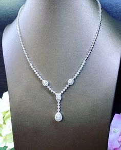 HANDCRAFTED TO PERFECTION! SPECIAL, BRIDAL PERFECT DESIGN! Featuring 4 pcs of large 0.2-0.3 carat pear diamond and 197 accent, UNTREATED AND GENUINE F/VS QUALITY SPARKLING DIAMONDS! Perfect for everyday! SET IN 18K SOLID WHITE GOLD HANDCRAFTED NECKLACE! Perfect as a gift or necklace for any occasion! Sometimes round diamonds are just so boring, why not have a little fun and try pear shaped diamonds? It's symmetric. It's sparkling. And it's eternally precious! SUGGESTED RETAIL VALUE: $7,800 DIAMO Luxury White Pear-shaped Diamond Necklace, Luxury Pear Shaped Diamond Necklace For Anniversary, Pear-shaped Cubic Zirconia Diamond Necklace For Formal Occasions, Formal Pear-shaped Cubic Zirconia Diamond Necklace, Platinum White Gold Diamond Necklace For Wedding, Classic Platinum Necklace For Wedding, Timeless Sterling Silver Diamond Necklace For Wedding, Pear-shaped Cubic Zirconia Wedding Jewelry In Diamond White, Classic White Diamond Pear-shaped Necklace