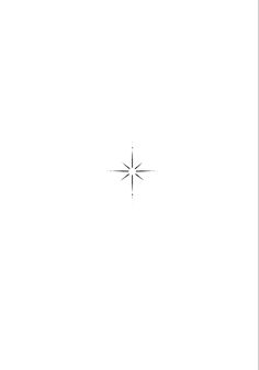 a black and white photo of a snowflake