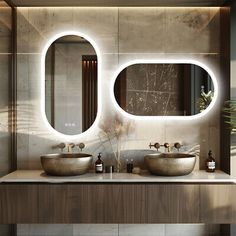 a bathroom with two sinks and mirrors on the wall next to a potted plant