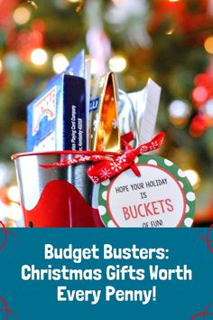 a bucket full of christmas gifts with the words budget busters christmas gifts worth every penny