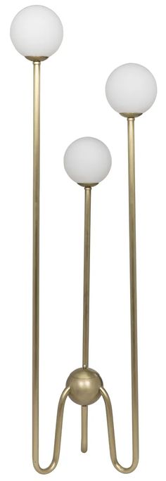 two white lamps sitting next to each other on top of a metal stand with one light on