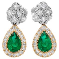 It comes with the Gemological Appraisal by GIA GG/AJP All Gemstones are Natural 2 Emeralds = 0.84 Carats 44 Diamonds = 0.34 Carats Metal: 18K White & Yellow Gold Dimensions: 17 x 7 mm Luxury Green Diamond Earrings With Halo Design, Earring Video, Diamond Dangle Earrings, Emerald Stone, Modern Earrings, Natural Emerald, Modern Jewelry, White Diamond, Jewelry Earrings Dangle