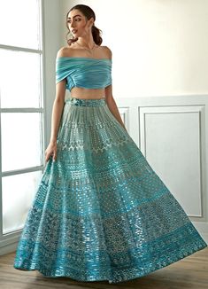 Sky Blue Ombre Off Shoulder Lehenga Set Studio Iris - Fabilicious Fashion Blue Haldi Outfit, Sky Blue Lehenga Wedding, Blue Sangeet Outfit, Sky Lehenga, Dresses For Sangeet, Sangeet Outfit Ideas, Sangeet Outfit Bridal, Off Shoulder Lehenga, Ombre Lehenga