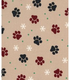 an animal print fabric with red and black paw prints