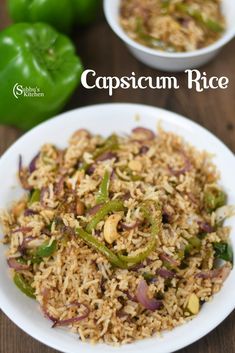 capsicum rice in a white bowl on a wooden table with peppers and green peppers