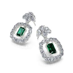 This classic earrings are timeless, bringing an opulent finish to casual and evening ensembles. Expertly crafted in sterling silver, each earring showcases a very fine radiant cut stone, surrounded by a single row of round brilliant white stones. A magnificent combination of radiant, teardrop and round cut stones all set in a gleaming silver design. Sweep hair into a low chignon to display the design in full.Carat Weight: 3 ctStone Size: 5*7 mmStone Type: Jeulia® StoneNumber of Stones: 2 Stone S Emerald Halo, Low Chignon, Harry Styles Concert, White Stones, Classic Earrings, Silver Design, Radiant Cut, Earring Jewelry, Pretty Earrings