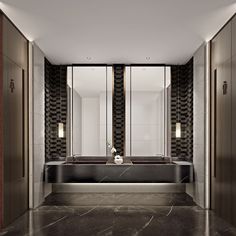 an elegant bathroom with marble floors and walls