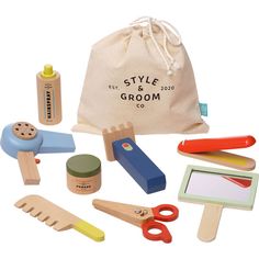 the wooden toys are set up in a bag