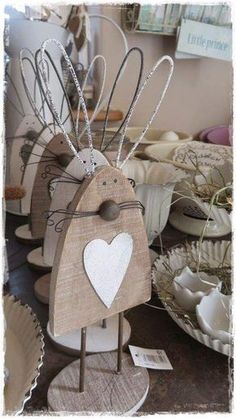 some wooden sculptures with hearts on them