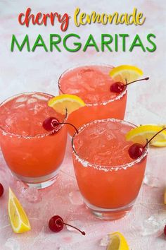 cherry lemonade margaritas are garnished with fresh cherries