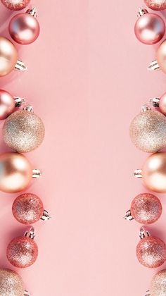 pink and gold christmas ornaments on a pink background with space for the wording ornament