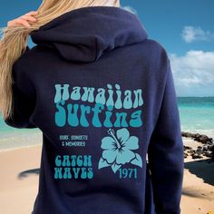 "Hawaiian Surf Sweatshirt. Lightweight, fine gauge crewneck sweatshirts for women are perfect for layering. This is a must-have for any season. Trending sweatshirt: https://etsy.me/3iSkkmg Trendy shirts: https://etsy.me/3MywvSr Vacation shirts: https://etsy.me/3BcsHPQ ⚡️ Thank you for stopping by The Standifer Exchange! 😉 Please click the 'heart' icon ❤️ to save my store to keep updated on new items: https://www.etsy.com/shop/TheStandiferExchange 🌻 Please read the full description: This hoodie Casual Surfing Hoodie Sweatshirt, Blue Crew Hoodie With Letter Print, Casual Crew Hoodie With Screen Print, Casual Crew Neck Hoodie With Screen Print, Casual Surfing Hoodie With Graphic Print, Casual Letter Print Hoodie For Beachwear, Long Sleeve Hoodie With Letter Print For Surfing, Hooded Letter Print Sweatshirt For Surfing, Crew Neck Top With Kangaroo Pocket For College