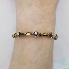 Absolutely stunning, very old bracelet of 14K yellow gold and three diamonds.  This piece has so many exquisite details! It has a twisted rope and filigree design. Diamonds are 2.5mm round each and the three of them total .18TCW - 2.5" diameter - Safety clasp - 9.87g Victorian Diamond Bracelets As Gift, Victorian Diamond Bracelets For Gift, Victorian Diamond Bracelets For Gifts, Vintage Diamond Bracelet With Diamond Accents, Vintage Diamond Bracelet With Accents, Vintage Bangle Bracelet With Single Cut Diamonds, Vintage Rose Cut Diamond Bracelet Gift, Vintage Diamond Accented Bangle Bracelets, Antique Diamond Accented Bracelets For Anniversary