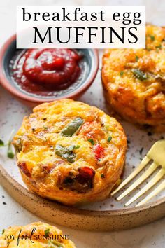 breakfast egg muffins on a plate with a fork