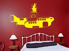 a yellow submarine wall decal in a bedroom