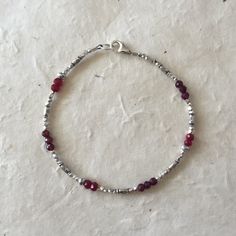 Garnet Ruby Karen Hill Tribe Thai Silver Beaded Bracelet, Sundance Style, Boho Stack Bracelet, January Birthstone, July Birthstone by LoveandLightArtistry on Etsy Handmade Adjustable Ruby Bracelets, Handmade Adjustable Ruby Bracelet, Adjustable Silver Ruby Bracelet, Silver Ruby Bracelet With Adjustable Fit, Sundance Style, Silver Beaded Bracelet, Stack Bracelet, Hill Tribe Silver, Multi Strand Bracelet