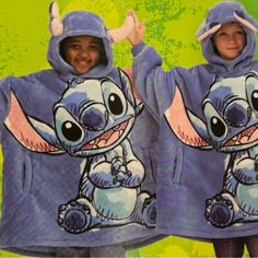 Style: Lilo & Stich Long Set-In Sleeves Ribbed Knit Cuffs Functional Side Pockets Pullover Hoodie Fleece Lined Sizes: One Size Fits Most (4 - 10) Cute Blue Hoodie Top, Blue Hoodie With Cartoon Print For Fall, Cute Blue Hooded Hoodie, Playful Blue Winter Sweatshirt, Blue Hooded Sweatshirt With Cartoon Print, Cute Blue Hoodie With Cartoon Print, Oversized Winter Sweatshirt, Playful Blue Hoodie Top, Playful Blue Hoodie With Long Sleeves