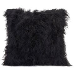 a black furry pillow on a white background