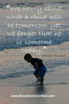 a little boy standing on top of a beach next to the ocean with a quote above it