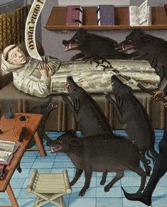 an old man laying in bed surrounded by black dogs