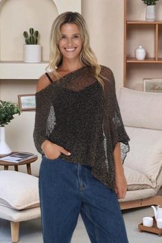 Easy slipover design and an asymmetrical hem lets you choose how to wear it, adding a little coverage over the hips. Metallic Yarn, Asymmetrical Hem, Asymmetric Hem, Pullover Sweater, Pullover Sweaters