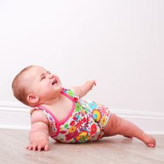 Our amazingly soft groovy bloom bubble romper will keep your little your little babe cool and comfy all summer long. These soft as butter flutter sleeve rompers are perfect for spring and summertime lounging. 93% Bamboo and 3% spandex Wash cold with like colors; stays soft wash after wash Snaps on legs makes for easy breezy diaper changes Not treated with flame retardants Swaddle sold seprately Summer Bubble Romper For Playtime In Spring, Cute Floral Print Bubble Romper For Playtime, Playful Floral Bubble Romper For Playwear, Cute Floral Bubble Romper For Beach, Playful Floral Print Bubble Romper For Playwear, Cute Floral Print Bubble Romper For The Beach, Cute Floral Print Bubble Romper For Beach, Multicolor Spring Bodysuit For Playwear, Spring Multicolor Bodysuit For Playwear