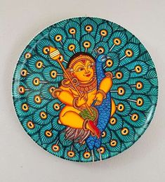 a decorative plate with an image of a person holding a bird on it's back