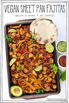 a sheet pan filled with chicken fajitas next to guacamole and salsa