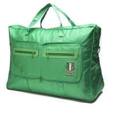 a large green bag with two zippers on the front and one has an emblem on it