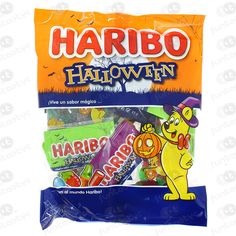 harbo halloween candy bag with an image of a dog holding a pumpkin on it